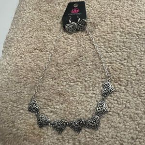Woman’s necklace and earring set